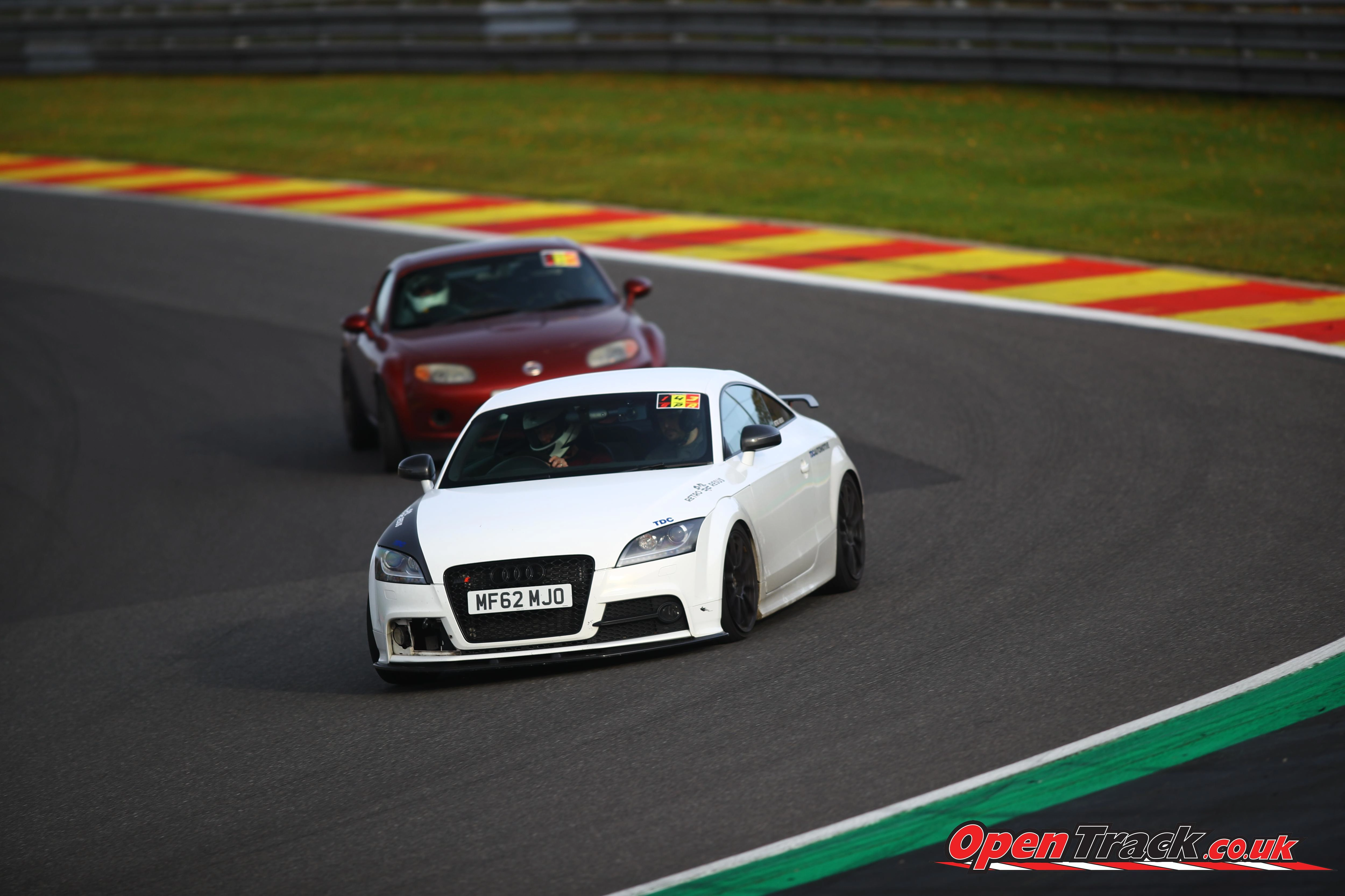2 cars on a track, the car in front belongs to Ross from TDC Automotive